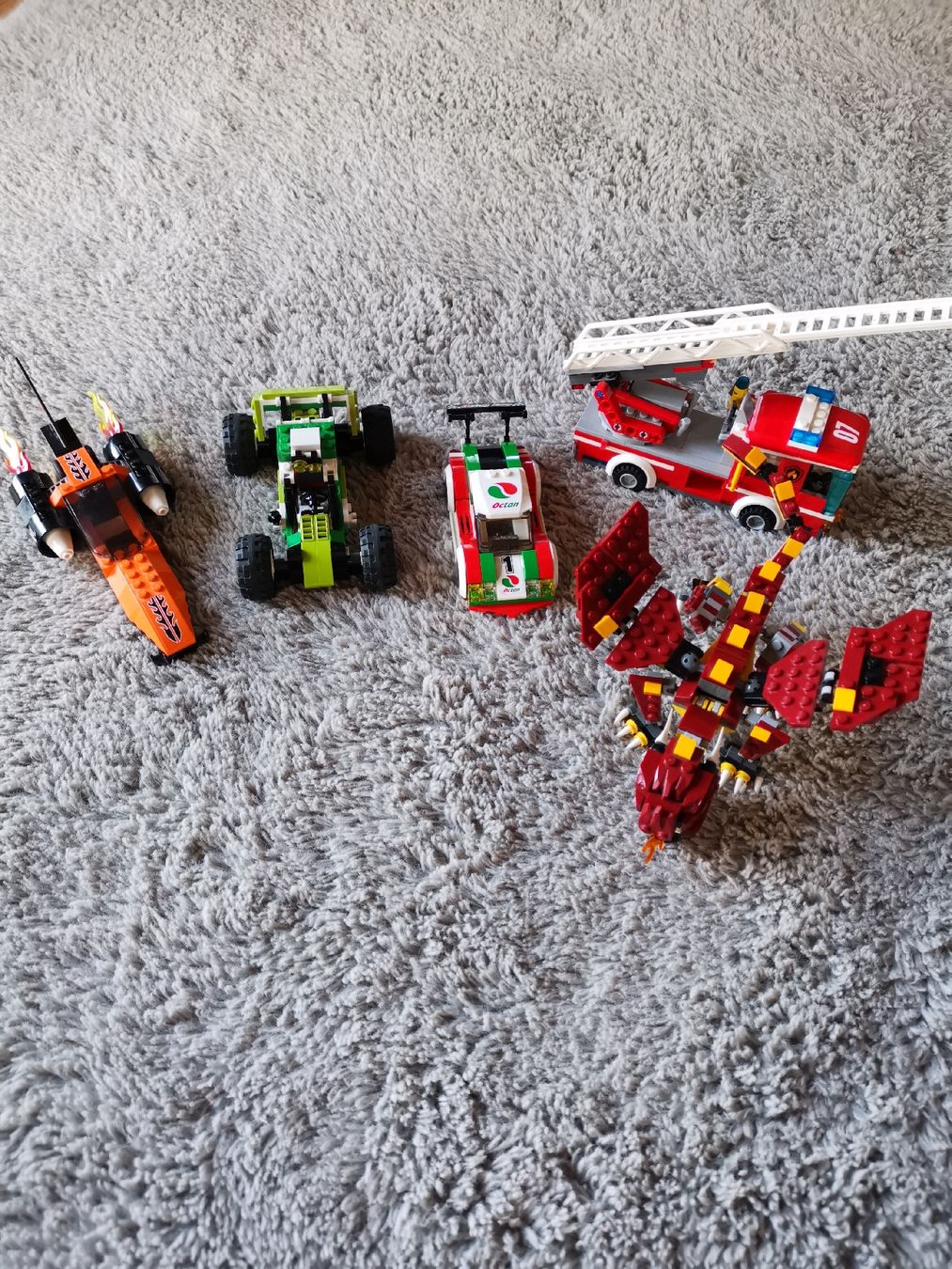 Modellini d'auto: Lego SetDrache, Rennauto, Feuerwehr – Usato da Lanzenhäusern venduto da Gimli72
