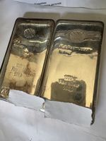 2  ingots of 1 kg of Silver 