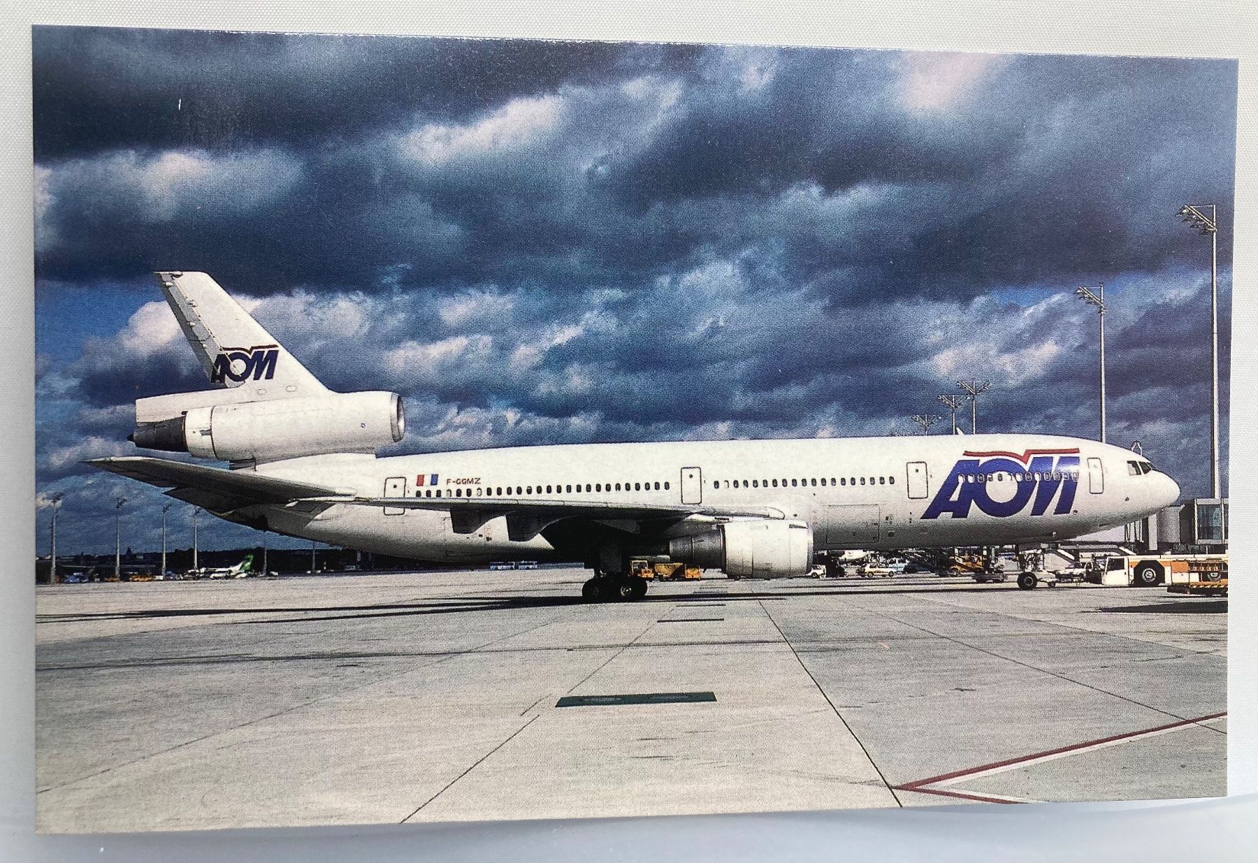 Cartoline postali: Postcard McDonnell Douglas DC-10-30 AOM – Usato da Lugano venduto da sel_x7bg