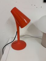 Philips Lirio Piculet LED table lamp in coral red