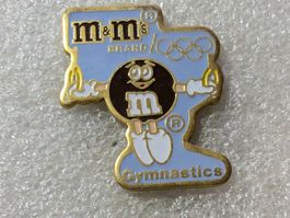 Ansteckpin 201: m&m's x Olympia