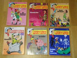 6 Lucky Luke Comics Hefte, 4 davon ältere noch mit Zigarette