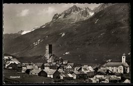 AK Hospental, Ort mit Turmruine, Kirche und Bergpanorama
