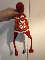 Berretto invernale rosso con fiocchi di neve taglia