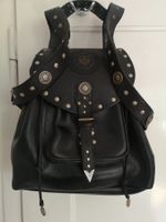 Vintage Lederrucksack mit schönen Aplikationen