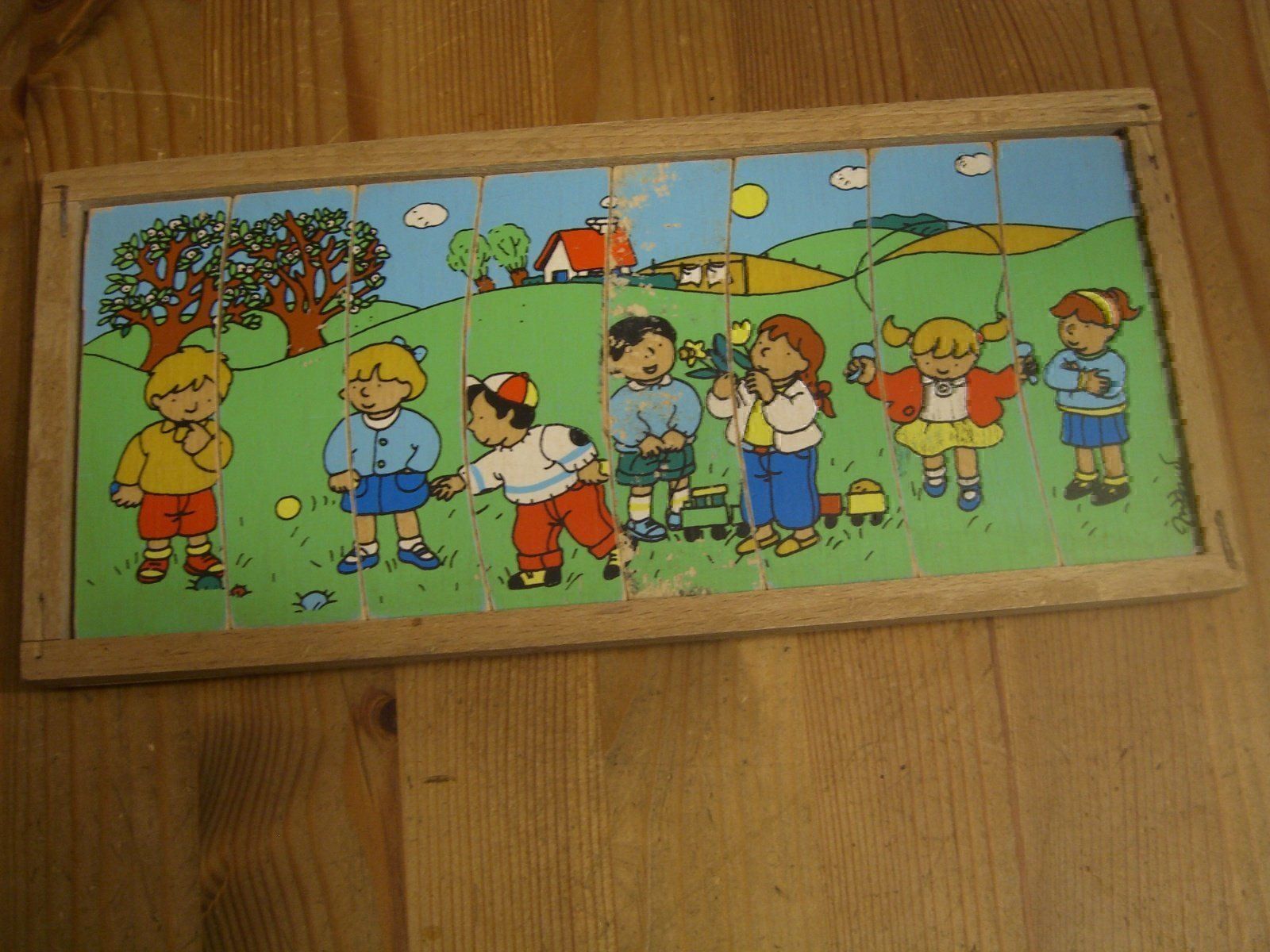 Ravensburger Puzzle: herziges, altes Holz-Rahmen-Puzzle – Usato da Winterthur venduto da Gaia