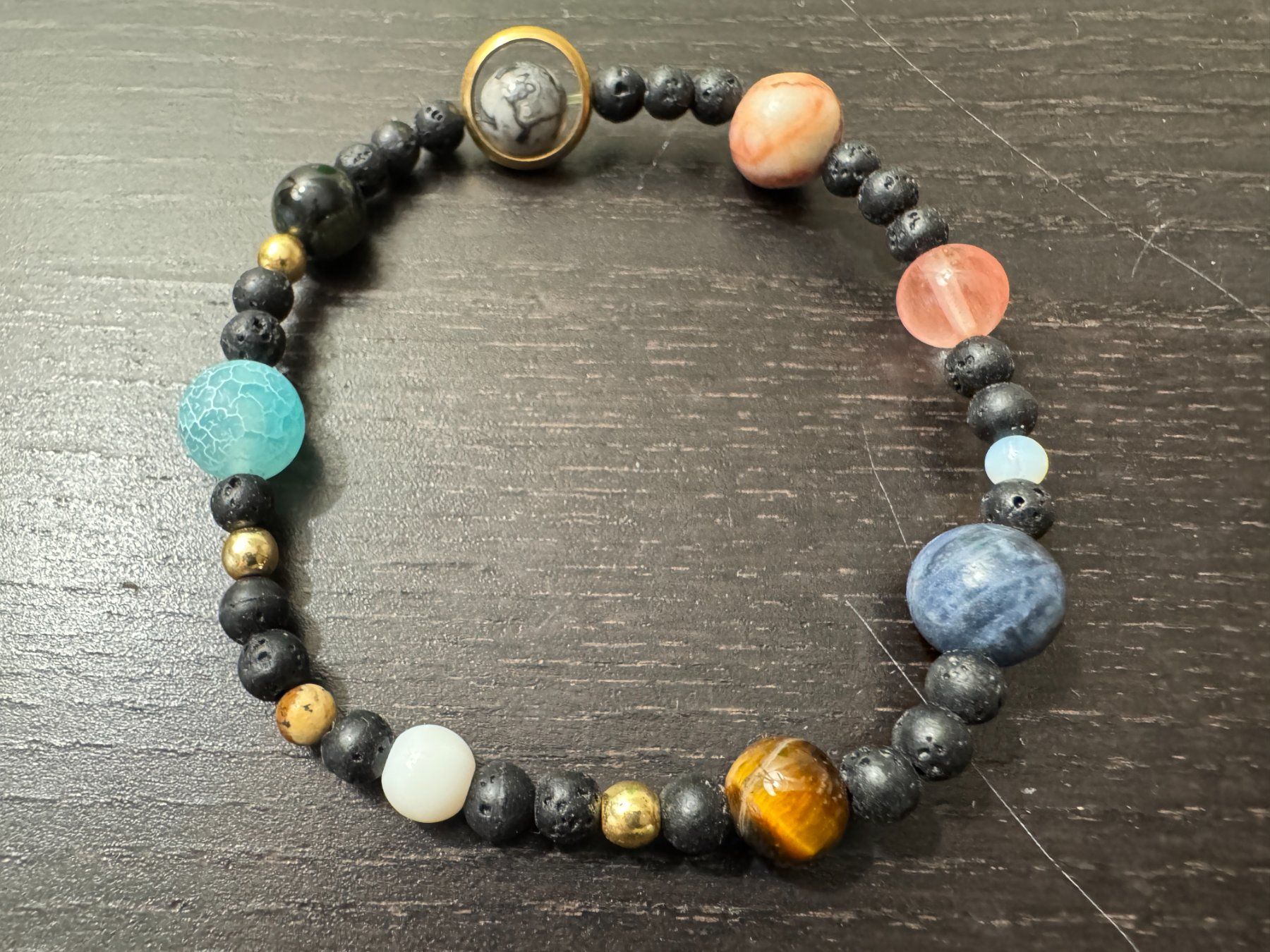 Bracciali & Braccialetti: Perlenarmband Sonnensystem, Armband, bracelet, solar system – Nuovo e nell'imballaggio originale da Winterthur venduto da YaV