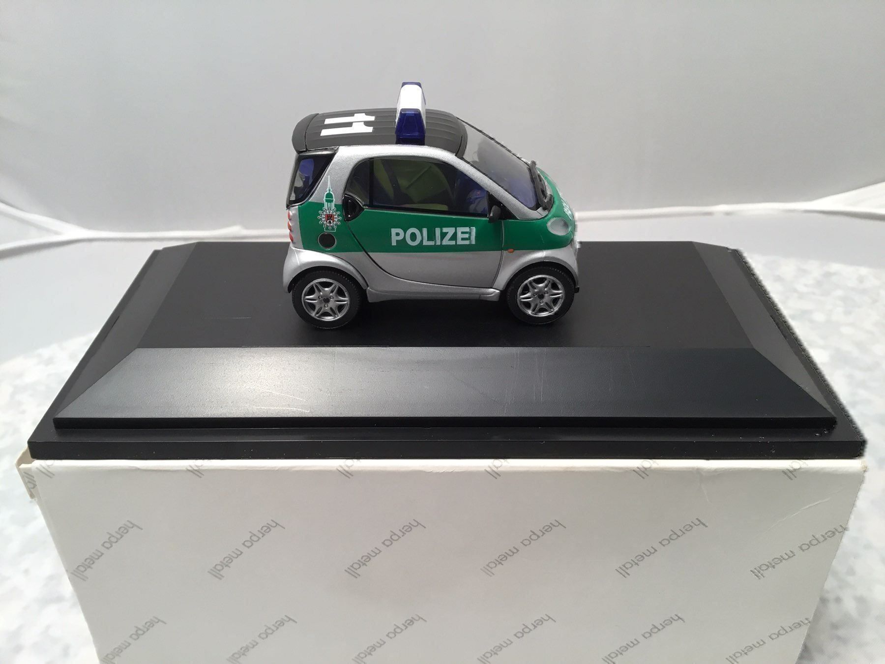 Smart Modellini d'auto: Polizei SMART – Nuovo e nell'imballaggio originale da Erlenbach im Simmental venduto da Model_box 4