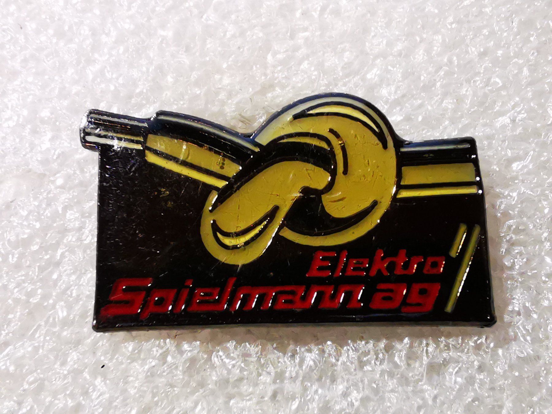 Placchette & Badge: Ansteckpin 24: Elektro Spielmann AG – Usato da Oppligen venduto da Pin-Fall-Shop