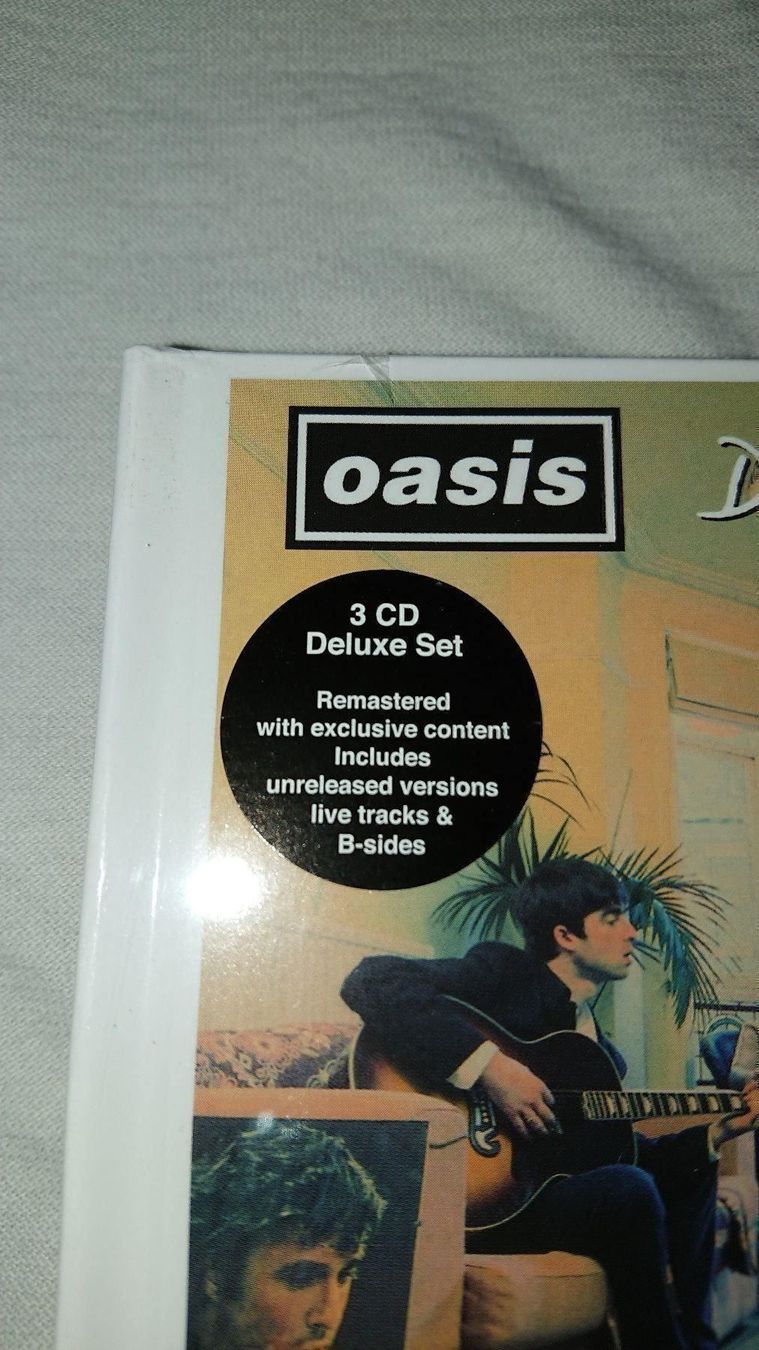 CD: Oasis / Definitely Maybe – Nuovo e nell'imballaggio originale da Cortaillod venduto da signep 1