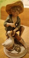 Antike Porzellanfigur Junge mit Gans, gemarkt mit A