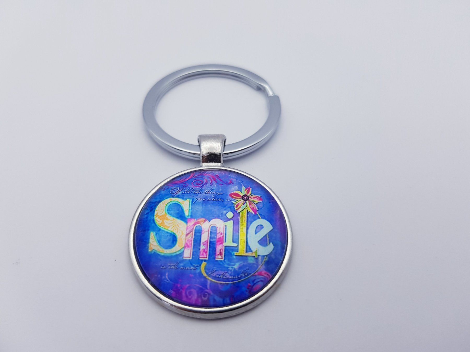 Portachiavi: Schlüsselanhänger "Smile" – Nuovo e nell'imballaggio originale da Menziken venduto da Zyropa