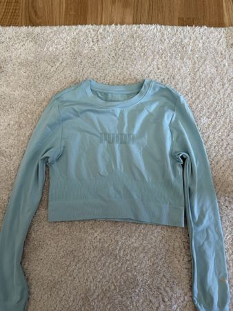 Top Puma manches longues femme bleu taille S état neuf