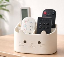 organizer per telecomandi a forma di piccoli animali