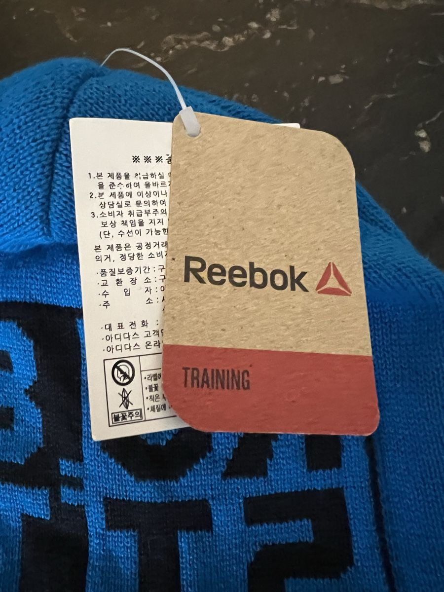 Reebok Altro abbigliamento per bambino: Bonnet Reebok neuf – Nuovo e nell'imballaggio originale da Savagnier venduto da Pivovar2 1