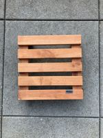 Wooden plant stand with wheels