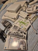 Nintendo Wii Konsole mit Zubehör und Spielen weiss