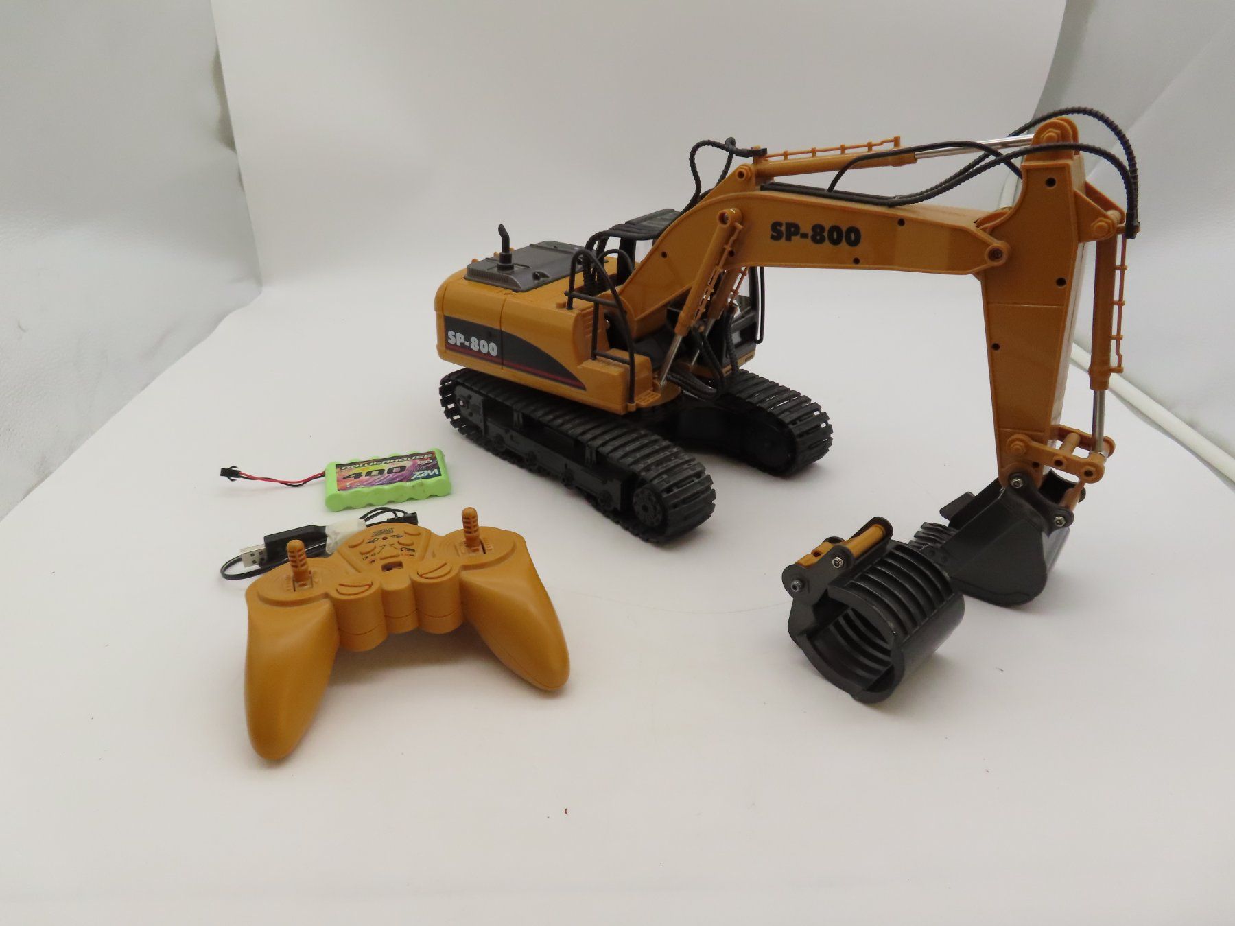 Giocattoli: Spielzeug Bagger RC (ungetestet) – Usato da Reinach BL venduto da WBZ-Flohmarkt