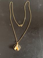 Glandeln an Goldkette