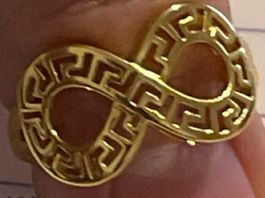 Jolie bague 52 plaquée jaune neuve et solide