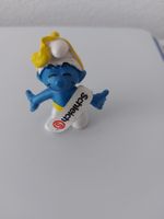 Schlumpf mit gelber Schleife