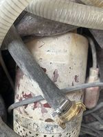 Tauchpumpe mit Schläuchen