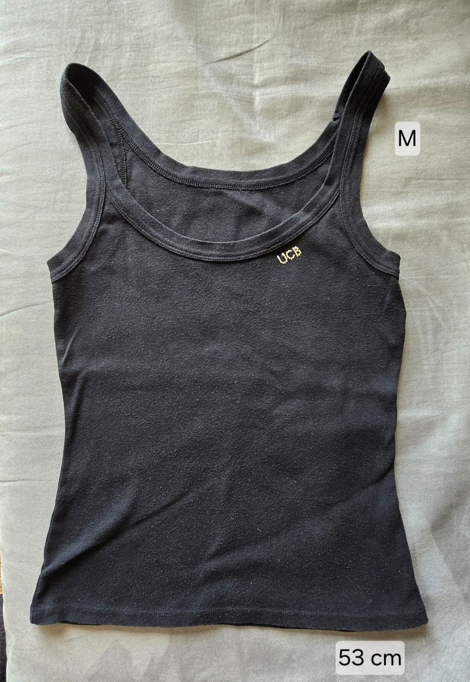Benetton Top: UCB Top schwarz Grösse M / 53 cm – Usato da Meggen venduto da everydaysale