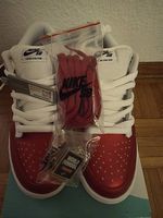 Nike x Supreme SB Dunk Low "Jewel Swoosh Red/White" sneakers