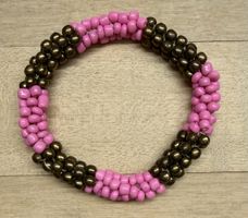 Armband perlen pink braun handgemacht guter Zustand