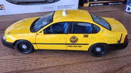 Chevrolet Impala Yellow Cap 1:18 Maisto