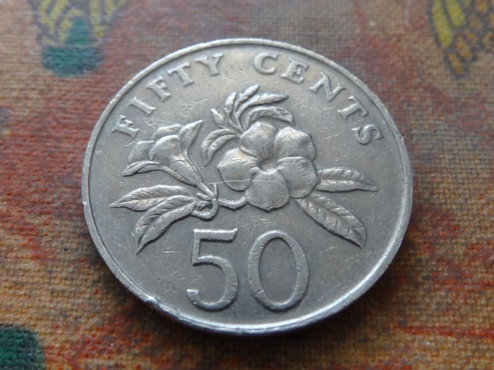 Tutti le monete: SINGAPOUR  50  Cents  1986 – Usato da Romanel-sur-Lausanne venduto da Swift13