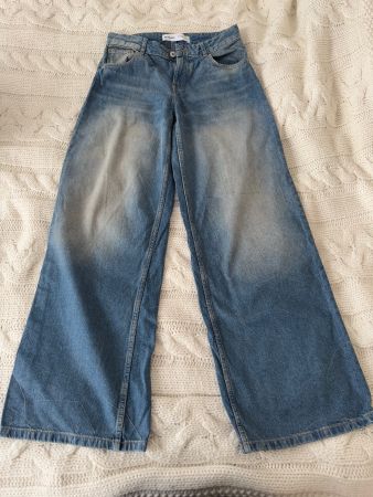 Wide leg blaue Jeans mit Wash