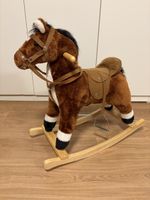 Schaukelpferd aus Plüsch mit Sattel braun guter Zustand