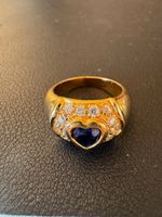 Wunderschöner vergoldeter Ring mit blauem Herz.
