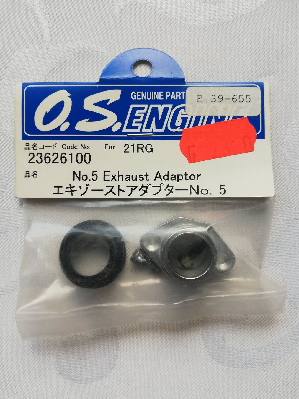 Modellismo RC: O.S. Motor 21RG Auspuff Adapter No. 5 – Nuovo e nell'imballaggio originale da Flüh venduto da AMS-Modellbau