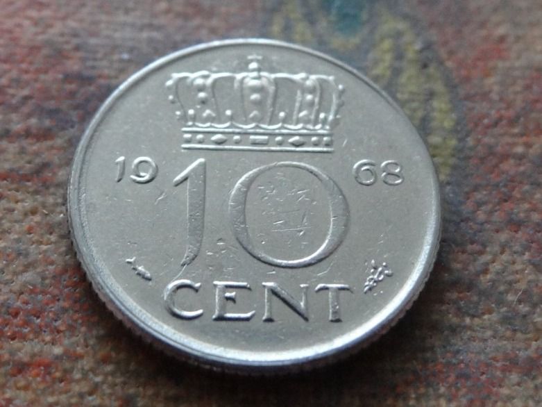 Tutti le monete: PAYS-BAS  Nederland  10  Cent  1968 – Usato da Romanel-sur-Lausanne venduto da Swift13
