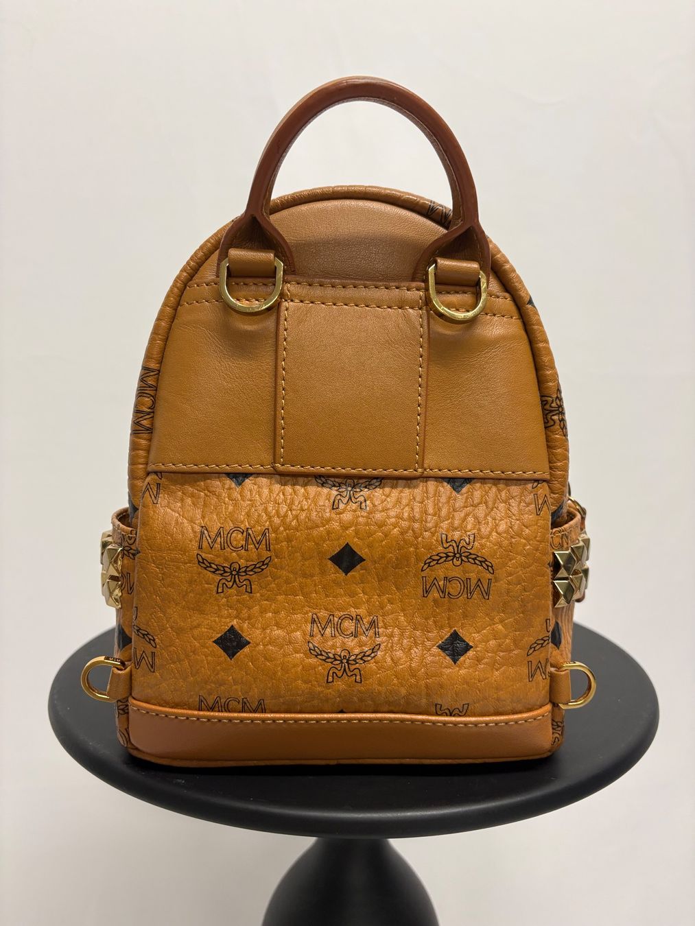 Mcm Borse da donna: MCM X-Mini Stark Bebe Boo Side Studs Rucksack in Cognac – Nuovo (secondo la descrizione) da Regensdorf venduto da secondchancefashion 3