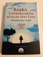 Türkischer Roman: "Baska Topraklarda Rüzgar Sert Eser"
