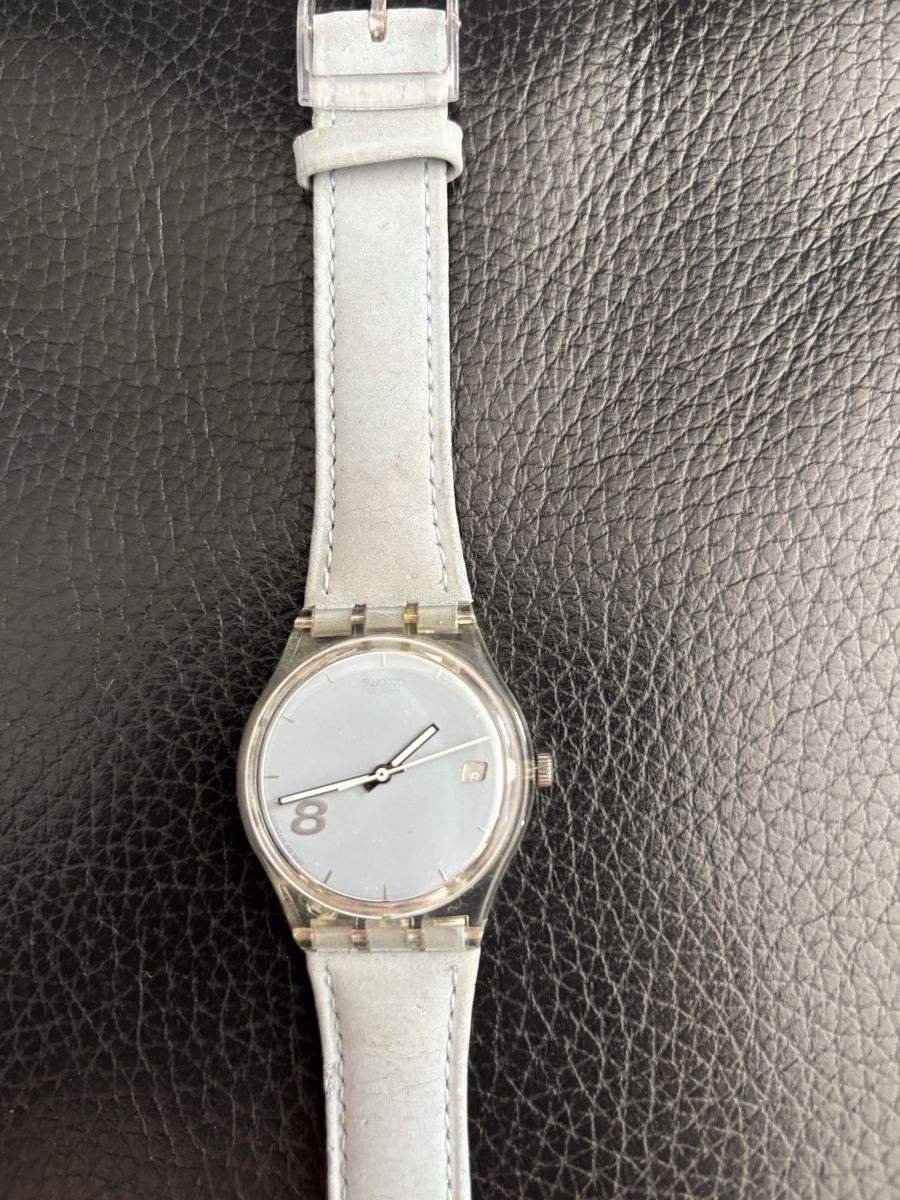 Swatch Orologi: Swatch Armbanduhr hellblau mit Lederband – Usato da Dübendorf venduto da mba_5yvw