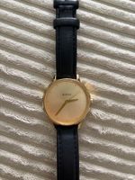 Nixon Uhr gold mit schwarzen Lederband