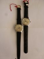 2 Herrenarmbanduhren, Handauzug