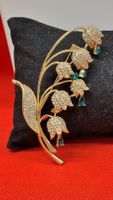 Elegante Brosche mit Strass und zarten Blueten, Goldfarben