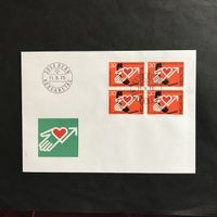Zst 569 Die dargebotene Hand 4er Block, FDC 11.9.75