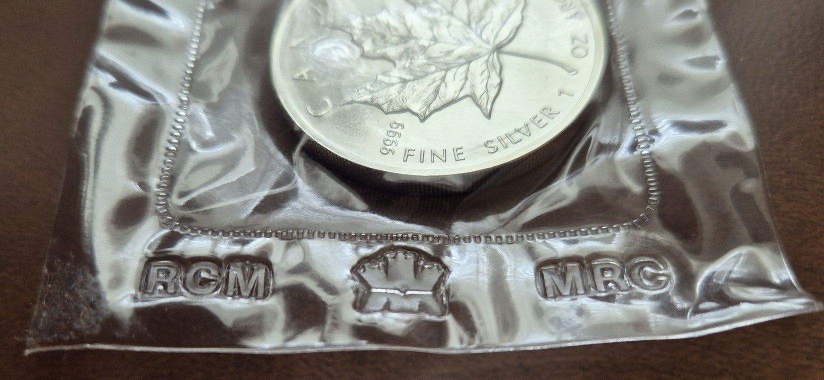 Tutti le monete: 1 Unze Silbermünze "Maple Leaf", Canada 1990, eingeschweisst – Nuovo e nell'imballaggio originale da St. Moritz venduto da Guenteratch 1