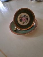 Kaffeetasse mit Untertasse goldfarben verzierte Rosen