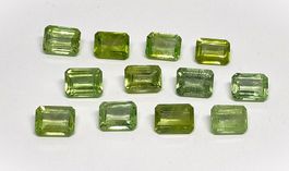 12x Péridots EM 8x6 mm - 20.06 ct - CERTIFICAT 740.- Fr