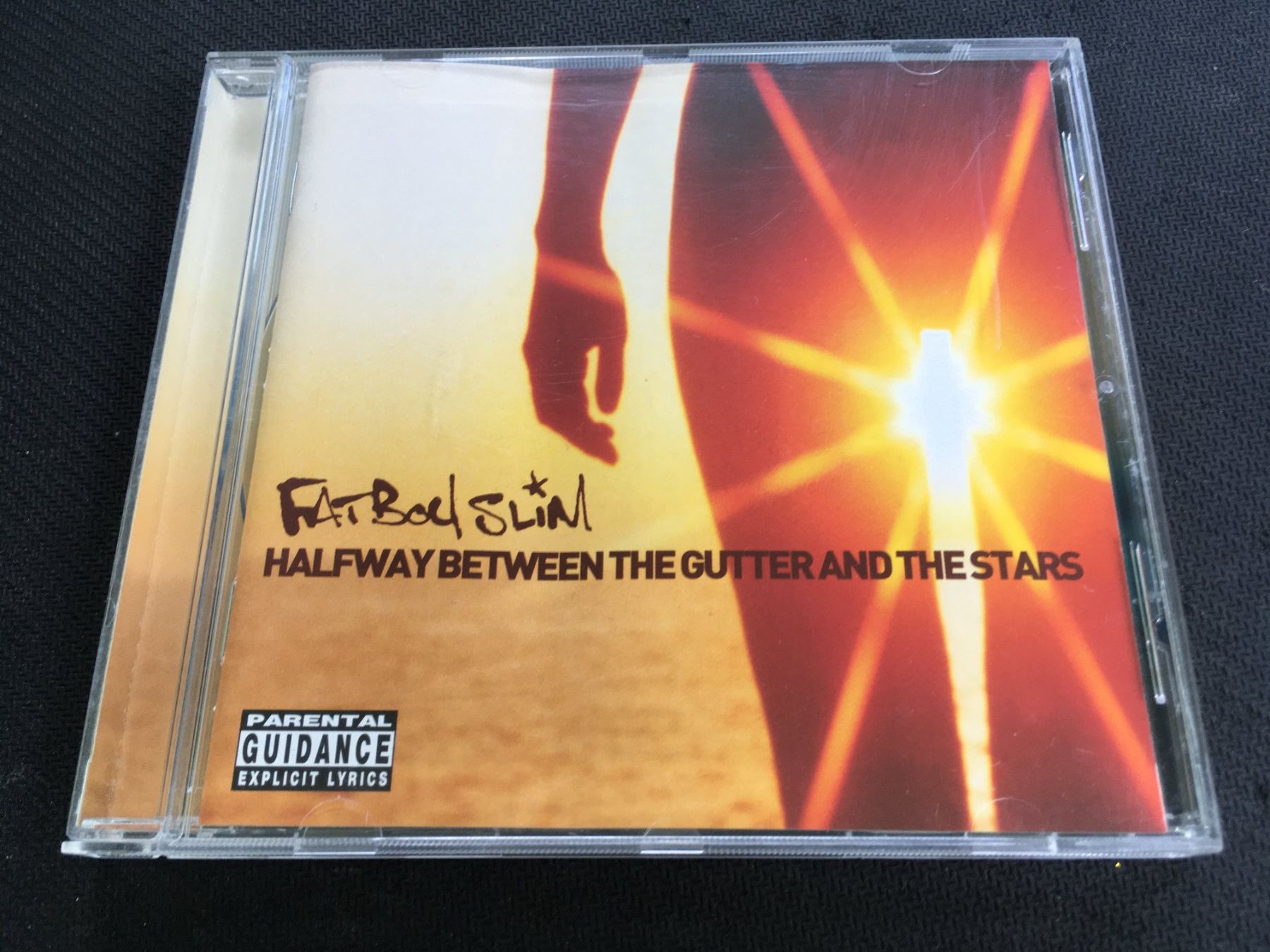 CD: Fat Boy Slim - Halfway between the gutter and the stars -CD- – Usato da St.Gallen venduto da MedienJoe