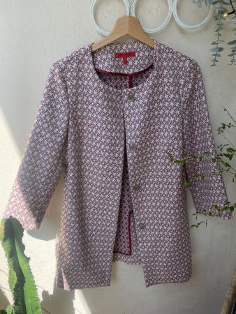 Veste motif rouge et blanc taille M bon état
