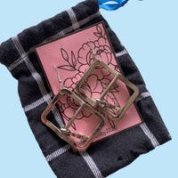 “Buckle in” earrings