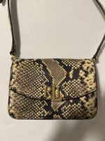 Sac bandoulière Ralph Lauren en peau de serpent, chic!